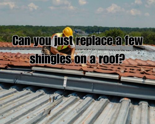 man replacing shingled roof