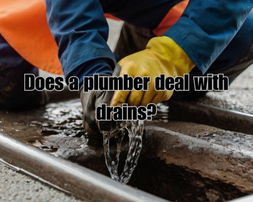a plumber working on drains while wearing gloves